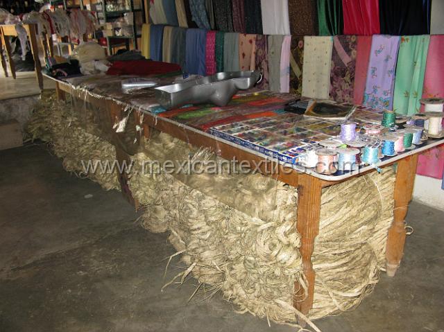 tula del rio03.JPG - Under the table are "tresnas" braids of palm which the store owner buys from the local people.
